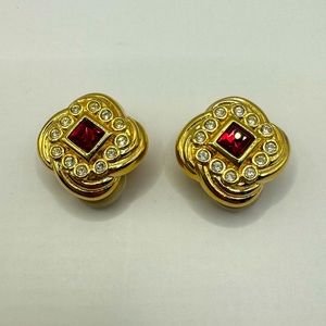 Swarovski clip on gold love knot w/red & clear crystals. Vintage earrings.